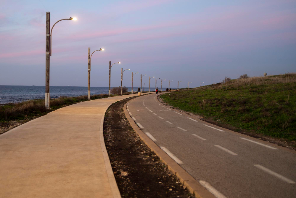 road-pedestrians-bicycles-nature-reserve-national-park-tel-shikmona-beach-promenade-haifa-israel